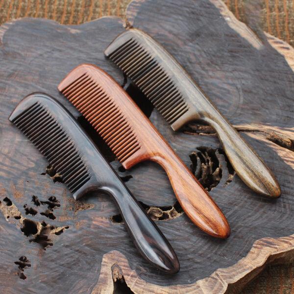 simple smooth wood comb, with long handle comb