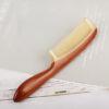 fine crafted smooth red wood and horn comb, with handle comb